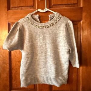 Elegant Gray Sweater with Embellished Neckline
